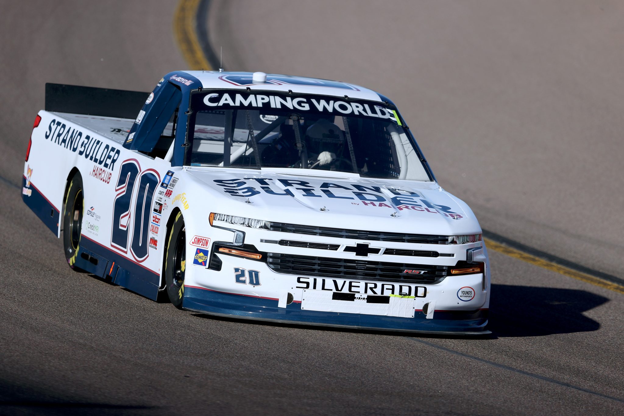 AVONDALE, ARIZONA - NOVEMBER 05: Spencer Boyd, driver of the #20 Hair Club Chevrolet, drives during qualifying for the NASCAR Camping World Truck Series Lucas Oil 150 at Phoenix Raceway on November 05, 2021 in Avondale, Arizona. (Photo by Christian Petersen/Getty Images) | Getty Images