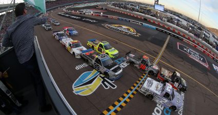 AVONDALE, ARIZONA - NOVEMBER 05: Chandler Smith, driver of the #18 Safelite AutoGlass Toyota, leads Sheldon Creed, driver of the #2 Liftkits4less.com Chevrolet, Todd Gilliland, driver of the #38 Frontline Enterprises Inc Ford, and Ben Rhodes, driver of the #99 Bombardier LearJet 75 Toyota, to the green flag to start the NASCAR Camping World Truck Series Lucas Oil 150 at Phoenix Raceway on November 05, 2021 in Avondale, Arizona. (Photo by Meg Oliphant/Getty Images) | Getty Images