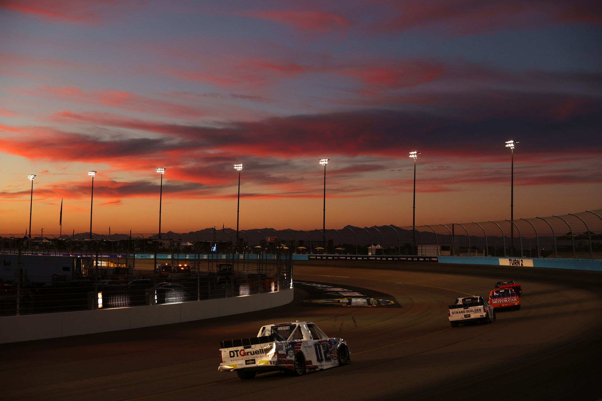 AVONDALE, ARIZONA - NOVEMBER 05: Kris Wright, driver of the #02 First National Bank Chevrolet, drives as the sun sets during the NASCAR Camping World Truck Series Lucas Oil 150 at Phoenix Raceway on November 05, 2021 in Avondale, Arizona. (Photo by Christian Petersen/Getty Images) | Getty Images