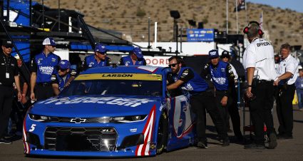 AVONDALE, ARIZONA - NOVEMBER 06: Crew members push the #5 HendrickCars.com Chevrolet, driven by Kyle Larson in the garage area during qualifying for the NASCAR Cup Series Championship at Phoenix Raceway on November 06, 2021 in Avondale, Arizona. (Photo by Jared C. Tilton/Getty Images) | Getty Images