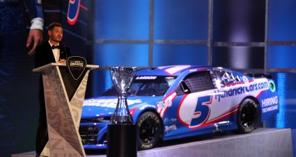 NASHVILLE, TENNESSEE - DECEMBER 02:  2021NASCAR Cup Series championship driver, Kyle Larson speaks during the NASCAR Champion's Banquet at the Music City Center on December 02, 2021 in Nashville, Tennessee. (Photo by Sean Gardner/Getty Images) | Getty Images