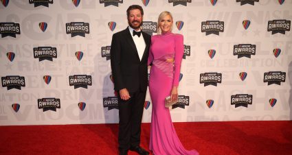 NASHVILLE, TENNESSEE - DECEMBER 02:  NASCAR Cup Series driver Martin Truex Jr. and guest Sherry Pollex pose on the red carpet prior to the NASCAR Champion's Banquet at the Music City Center on December 02, 2021 in Nashville, Tennessee. (Photo by Chris Graythen/Getty Images) | Getty Images