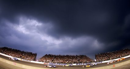 INDIANAPOLIS, IN - AUGUST 6:  Cars race on the track during the NASCAR Busch Series Kroger 200 on August 6, 2005 at Indianapolis Raceway Park in Indianapolis, Indiana. (Photo By Streeter Lecka/Getty Images) | Getty Images