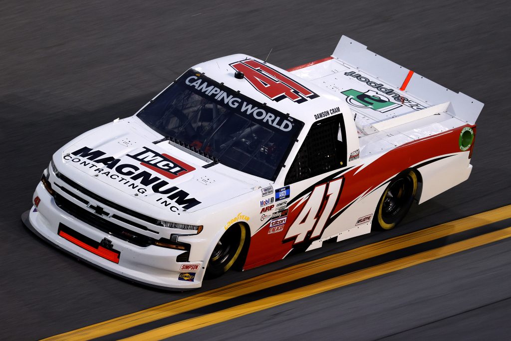 DAYTONA BEACH, FLORIDA - FEBRUARY 11: Dawson Cram, driver of the #41 Magnum Contracting Inc. Chevrolet, practices for the NASCAR Camping World Truck Series NextEra Energy 250 at Daytona International Speedway on February 11, 2021 in Daytona Beach, Florida. (Photo by Jared C. Tilton/Getty Images) | Getty Images