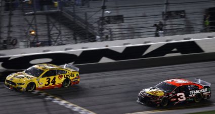DAYTONA BEACH, FLORIDA - FEBRUARY 14: Michael McDowell, driver of the #34 Love's Travel Stops Ford, crosses the finish line to win during the NASCAR Cup Series 63rd Annual Daytona 500 at Daytona International Speedway on February 14, 2021 in Daytona Beach, Florida. (Photo by Jared C. Tilton/Getty Images) | Getty Images