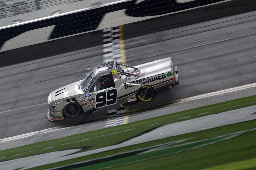 DAYTONA BEACH, FLORIDA - FEBRUARY 19: Ben Rhodes, driver of the #99 Bombardier LearJet 75 Toyota, crosses the finish line to win the NASCAR Camping World Truck Series BrakeBest Brake Pads 159 At Daytona Presented by O'Reilly at Daytona International Speedway on February 19, 2021 in Daytona Beach, Florida. (Photo by Chris Graythen/Getty Images) | Getty Images