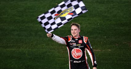 DAYTONA BEACH, FLORIDA - FEBRUARY 21: Christopher Bell, driver of the #20 Rheem Toyota, celebrates with the checkered flag after winning the NASCAR Cup Series O'Reilly Auto Parts 253 at Daytona International Speedway on February 21, 2021 in Daytona Beach, Florida. (Photo by James Gilbert/Getty Images) | Getty Images