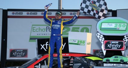 HAMPTON, GEORGIA - MARCH 20: Justin Allgaier, driver of the #7 Axalta/EchoPark Automotive Chevrolet, celebrates in victory lane after winning the NASCAR Xfinity Series EchoPark 250 at Atlanta Motor Speedway on March 20, 2021 in Hampton, Georgia. (Photo by Sean Gardner/Getty Images) | Getty Images