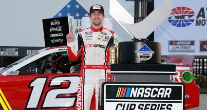 HAMPTON, GEORGIA - MARCH 21: Ryan Blaney, driver of the #12 BodyArmor Ford, celebrates in victory lane after winning the NASCAR Cup Series Folds of Honor QuikTrip 500 at Atlanta Motor Speedway on March 21, 2021 in Hampton, Georgia. (Photo by Sean Gardner/Getty Images) | Getty Images