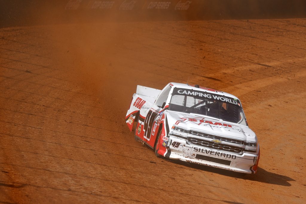 BRISTOL, TENNESSEE - MARCH 26: Andrew Gordon, driver of the #49 CMI Insulation Chevrolet, drives during practice for the NASCAR Camping World Truck Series Pinty's Truck Race on Dirt at Bristol Motor Speedway on March 26, 2021 in Bristol, Tennessee. (Photo by Jared C. Tilton/Getty Images) | Getty Images
