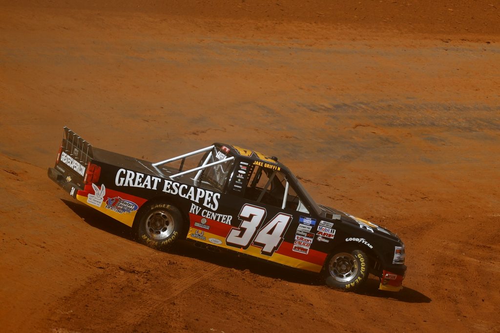 BRISTOL, TENNESSEE - MARCH 26: Jake Griffin, driver of the #34 Great Escapes RV Center Toyota, spins during practice for the NASCAR Camping World Truck Series Pinty's Truck Race on Dirt at Bristol Motor Speedway on March 26, 2021 in Bristol, Tennessee. (Photo by Jared C. Tilton/Getty Images) | Getty Images