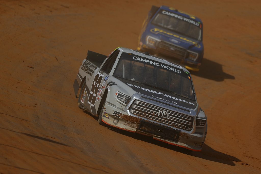 BRISTOL, TENNESSEE - MARCH 26: Ben Rhodes, driver of the #99 Bombardier LearJet 75 Toyota, drives during practice for the NASCAR Camping World Truck Series Pinty's Truck Race on Dirt at Bristol Motor Speedway on March 26, 2021 in Bristol, Tennessee. (Photo by Jared C. Tilton/Getty Images) | Getty Images