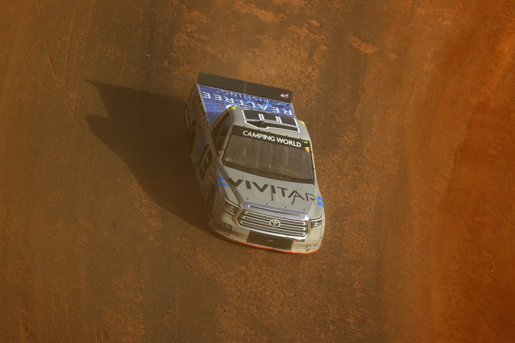 BRISTOL, TENNESSEE - MARCH 26: Johnny Sauter, driver of the #13 Vivitar/RealTree Toyota, drives during practice for the NASCAR Camping World Truck Series Pinty's Truck Race on Dirt at Bristol Motor Speedway on March 26, 2021 in Bristol, Tennessee. (Photo by Jared C. Tilton/Getty Images) | Getty Images