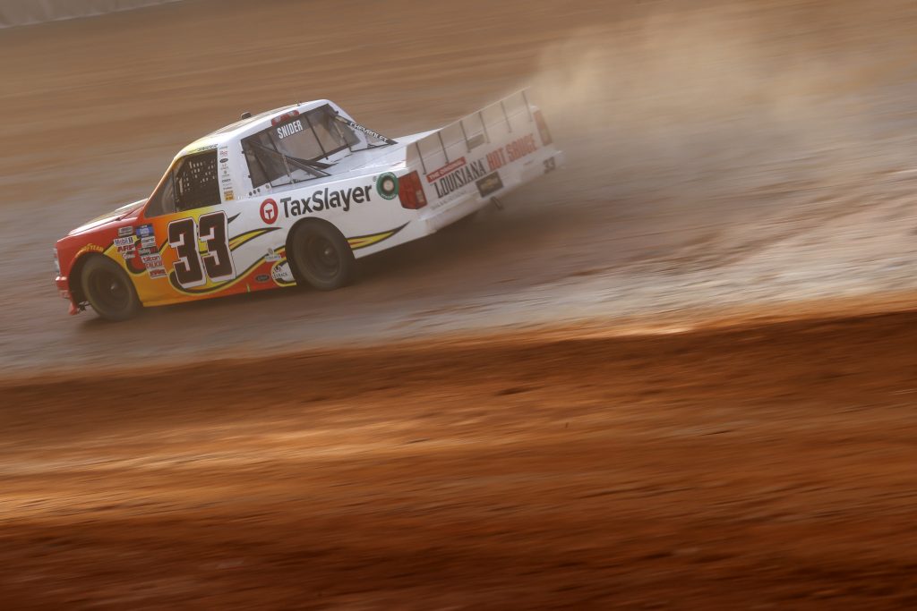 BRISTOL, TENNESSEE - MARCH 26: Myatt Snider, driver of the #33 Louisiana Hot Sauce Chevrolet, drives during practice for the NASCAR Camping World Truck Series Pinty's Truck Race on Dirt at Bristol Motor Speedway on March 26, 2021 in Bristol, Tennessee. (Photo by Chris Graythen/Getty Images) | Getty Images