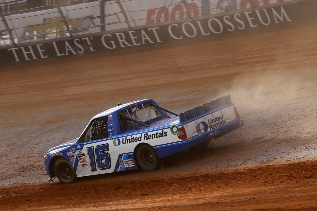 BRISTOL, TENNESSEE - MARCH 26: Austin Hill, driver of the #16 United Rentals Toyota, drives during practice for the NASCAR Camping World Truck Series Pinty's Truck Race on Dirt at Bristol Motor Speedway on March 26, 2021 in Bristol, Tennessee. (Photo by Chris Graythen/Getty Images) | Getty Images