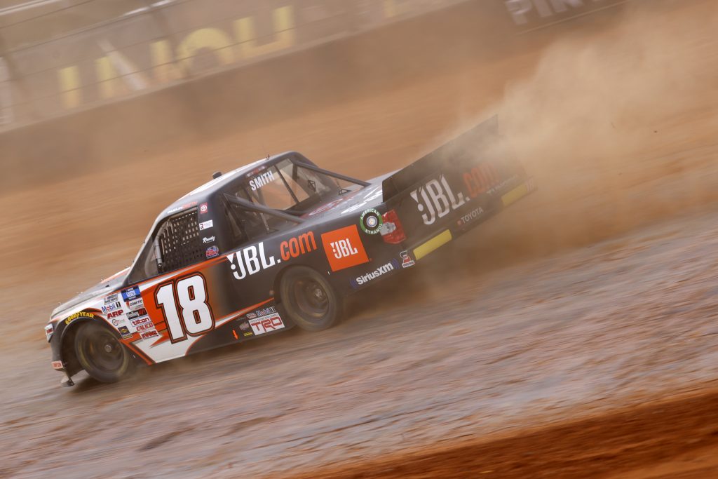 BRISTOL, TENNESSEE - MARCH 26: Chandler Smith, driver of the #18 JBL Toyota, drives during practice for the NASCAR Camping World Truck Series Pinty's Truck Race on Dirt at Bristol Motor Speedway on March 26, 2021 in Bristol, Tennessee. (Photo by Chris Graythen/Getty Images) | Getty Images