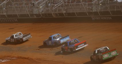 BRISTOL, TENNESSEE - MARCH 26:  Raphael Lessard, driver of the #24 Chevy Accessories Chevrolet, Bubba Wallace, driver of the #11 Columbia Outdoor Clothing Toyota, Jessica Friesen, driver of the #62 Halmar International Toyota, and Kevin Harvick, driver of the #17 Hunt Brothers Pizza Ford, race during practice for the NASCAR Camping World Truck Series Pinty's Truck Race on Dirt at Bristol Motor Speedway on March 26, 2021 in Bristol, Tennessee. (Photo by Jared C. Tilton/Getty Images) | Getty Images