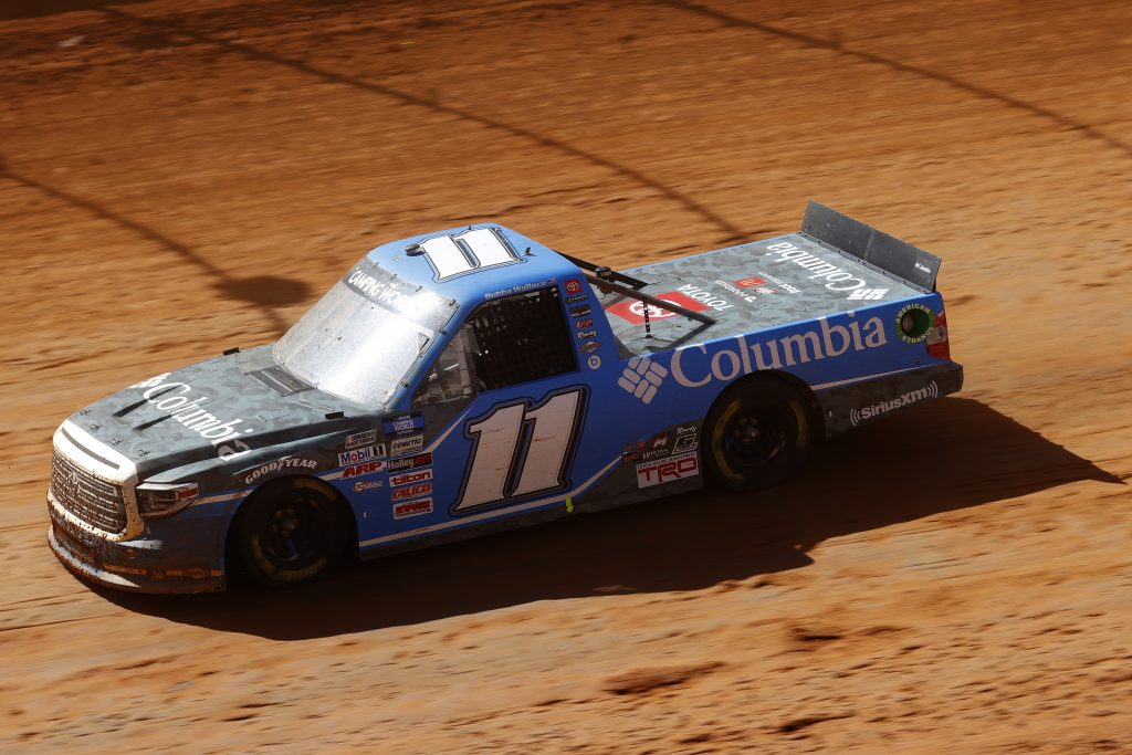 BRISTOL, TENNESSEE - MARCH 29: Bubba Wallace, driver of the #11 Columbia Outdoor Clothing Toyota, drives during the NASCAR Camping World Truck Series Pinty's Truck Race on Dirt at Bristol Motor Speedway on March 29, 2021 in Bristol, Tennessee. (Photo by Chris Graythen/Getty Images) | Getty Images