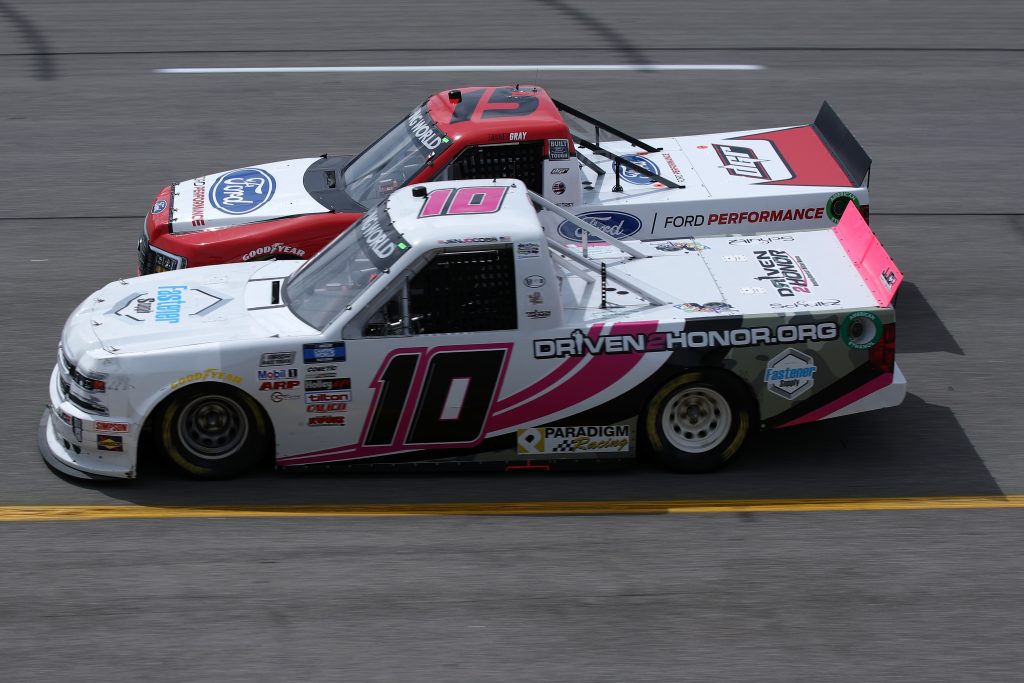 RICHMOND, VIRGINIA - APRIL 17: Jennifer Jo Cobb, driver of the #10 Fastener Supply Company Chevrolet, and Tanner Gray, driver of the #15 Ford Performance Ford, race during the NASCAR Camping World Truck Series ToyotaCare 250 at Richmond Raceway on April 17, 2021 in Richmond, Virginia. (Photo by Sean Gardner/Getty Images) | Getty Images