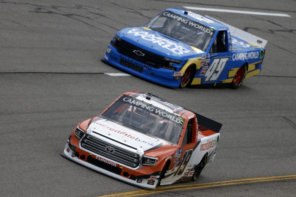 RICHMOND, VIRGINIA - APRIL 17: Derek Kraus, driver of the #19 Incredible Bank Toyota, and Ray Ciccarelli, driver of the #49 CMI Motorsports Chevrolet, race during the NASCAR Camping World Truck Series ToyotaCare 250 at Richmond Raceway on April 17, 2021 in Richmond, Virginia. (Photo by Brian Lawdermilk/Getty Images) | Getty Images