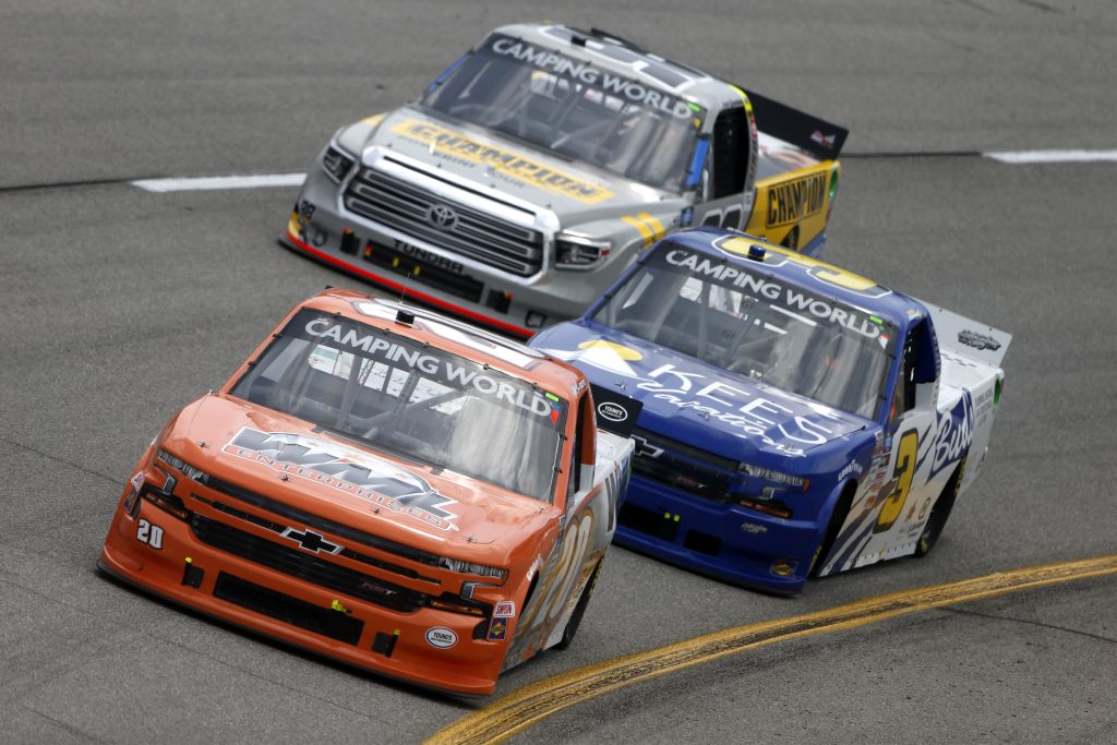 RICHMOND, VIRGINIA - APRIL 17: Spencer Boyd, driver of the #20 WML Enterprises Chevrolet, and Howie Disavino III, driver of the #3 KEES Vacations/Bud's Chevrolet, race during the NASCAR Camping World Truck Series ToyotaCare 250 at Richmond Raceway on April 17, 2021 in Richmond, Virginia. (Photo by Brian Lawdermilk/Getty Images) | Getty Images