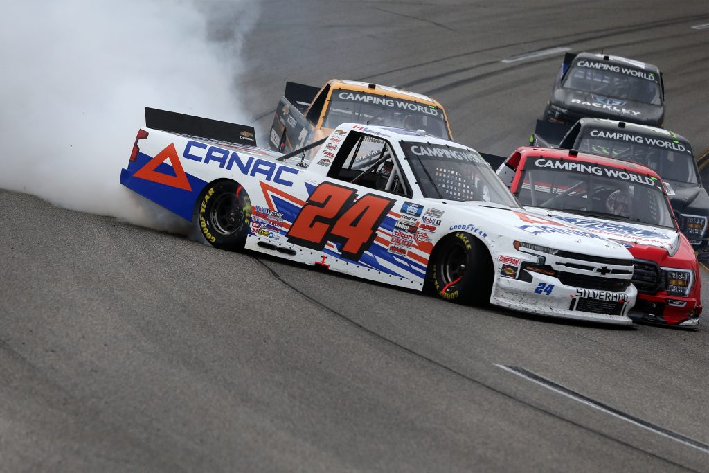 RICHMOND, VIRGINIA - APRIL 17: Raphael Lessard, driver of the #24 CANAC Chevrolet, spins after an on-track on-track incident with Tanner Gray, driver of the #15 Ford Performance Ford, during the NASCAR Camping World Truck Series ToyotaCare 250 at Richmond Raceway on April 17, 2021 in Richmond, Virginia. (Photo by Brian Lawdermilk/Getty Images) | Getty Images