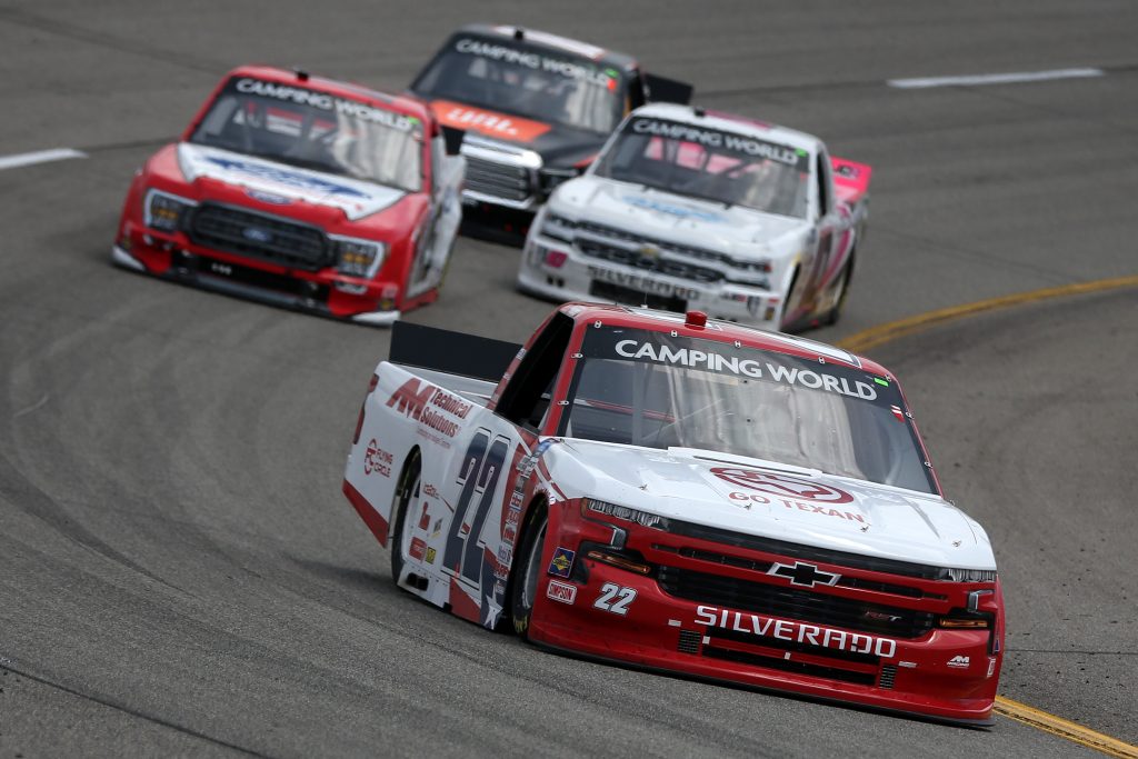 RICHMOND, VIRGINIA - APRIL 17: Austin Wayne Self, driver of the #22 GO TEXAN/AM Technical Solutions Chevrolet, drives during the NASCAR Camping World Truck Series ToyotaCare 250 at Richmond Raceway on April 17, 2021 in Richmond, Virginia. (Photo by Brian Lawdermilk/Getty Images) | Getty Images