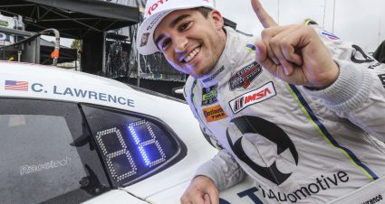 BRASELTON, GA - OCTOBER 02:  Cameron Lawrence celebrates after winning the GTD class pole position for the Petit Le Mans IMSA Tudor Series race at Road Atlanta on October 2, 2015 in Braselton, Georgia.  (Photo by Brian Cleary/Getty Images)