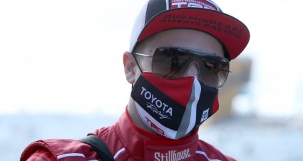 HOMESTEAD, FLORIDA - FEBRUARY 27: Santino Ferrucci, driver of the #26 Stillhouse Whiskey Toyota, walks the grid prior to  the NASCAR Xfinity Series Contender Boats 250 at Homestead-Miami Speedway on February 27, 2021 in Homestead, Florida. (Photo by Sean Gardner/Getty Images) | Getty Images