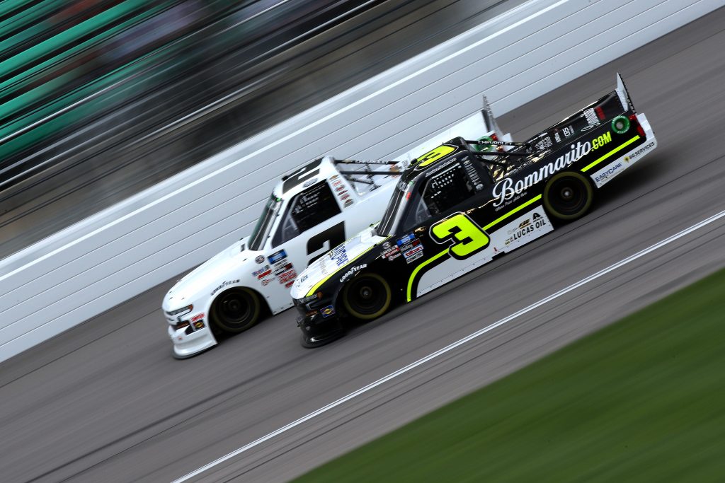 KANSAS CITY, KANSAS - MAY 01: Jordan Anderson, driver of the #3 EasyCare/BG Services/Bommarito Chevrolet, and Sheldon Creed, driver of the #2 Chevrolet, race during the NASCAR Camping World Truck Series Wise Power 200 at Kansas Speedway on May 01, 2021 in Kansas City, Kansas. (Photo by Sean Gardner/Getty Images) | Getty Images