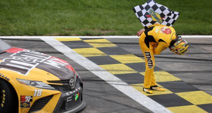 KANSAS CITY, KANSAS - MAY 02: Kyle Busch, driver of the #18 M&M's Mix Toyota, takes a bow after winning the NASCAR Cup Series Buschy McBusch Race 400 at Kansas Speedway on May 02, 2021 in Kansas City, Kansas. (Photo by James Gilbert/Getty Images) | Getty Images