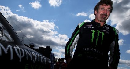 WATKINS GLEN, NY - AUGUST 07: Boris Said, driver of the #54 Monster Energy Toyota, stands in the garage area during practice for the NASCAR XFINITY Series Zippo 200 at Watkins Glen International on August 7, 2015 in Watkins Glen, New York. (Photo by Sean Gardner/NASCAR via Getty Images)