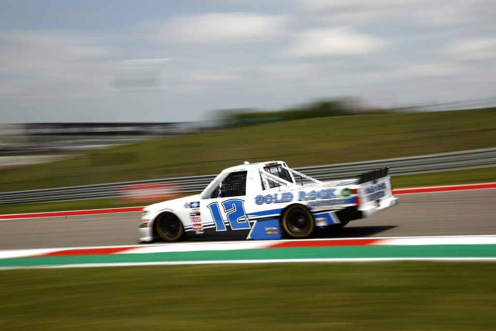 AUSTIN, TEXAS - MAY 21: Tate Fogleman, driver of the #12 Solid Rock Carriers Chevrolet, drives during practice for the NASCAR Camping World Truck Series Toyota Tundra 225 at Circuit of The Americas on May 21, 2021 in Austin, Texas. (Photo by Jared C. Tilton/Getty Images) | Getty Images