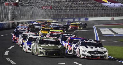 CONCORD, NORTH CAROLINA - MAY 24: Jimmie Johnson, driver of the #48 Ally Patriotic Chevrolet, and Brad Keselowski, driver of the #2 Miller Lite Ford, lead the field on an overtime restart during the NASCAR Cup Series Coca-Cola 600 at Charlotte Motor Speedway on May 24, 2020 in Concord, North Carolina. (Photo by Jared C. Tilton/Getty Images) | Getty Images