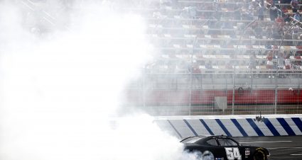 CONCORD, NORTH CAROLINA - MAY 29: Ty Gibbs, driver of the #54 Joe Gibbs Racing Toyota, celebrates with a burnout after winning the NASCAR Xfinity Series Alsco Uniforms 300 at Charlotte Motor Speedway on May 29, 2021 in Concord, North Carolina. (Photo by Jared C. Tilton/Getty Images) | Getty Images