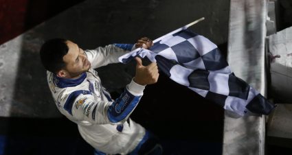 CONCORD, NORTH CAROLINA - MAY 30: Kyle Larson, driver of the #5 Metro Tech Chevrolet, gives a thumbs up to fans with the checkered flag after winning the NASCAR Cup Series Coca-Cola 600 at Charlotte Motor Speedway on May 30, 2021 in Concord, North Carolina. (Photo by Brian Lawdermilk/Getty Images) | Getty Images
