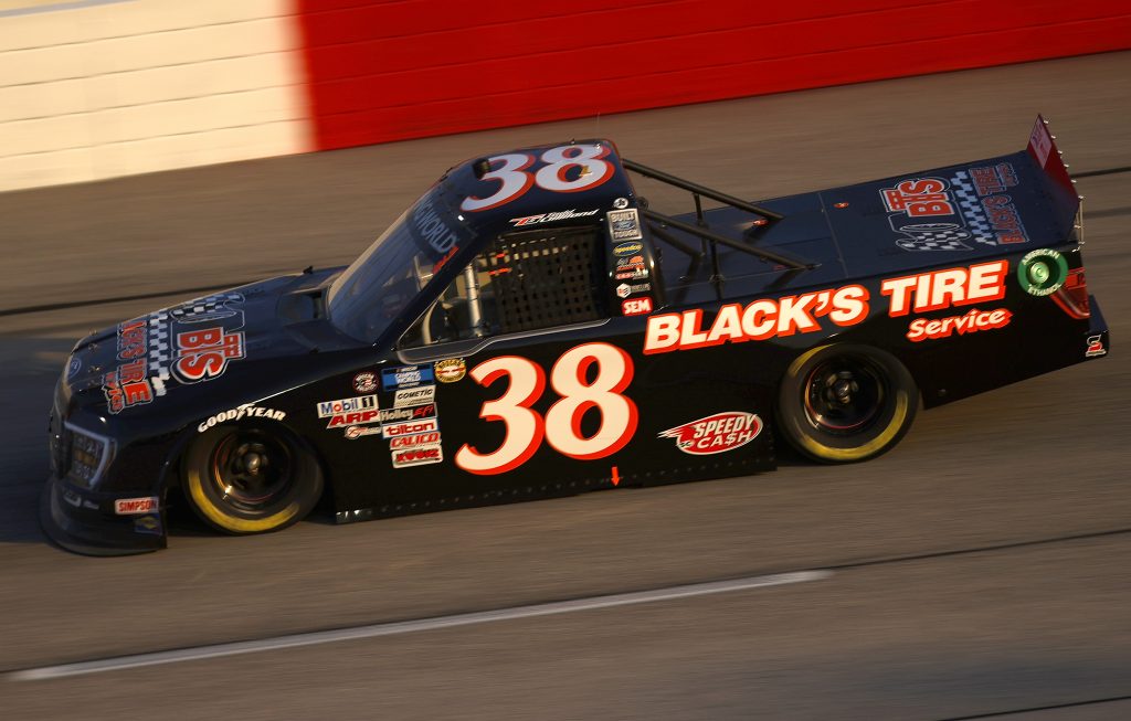DARLINGTON, SOUTH CAROLINA - MAY 07: Todd Gilliland, driver of the #38 Black's Tire Ford, drives during the NASCAR Camping World Truck Series LiftKits4Less.com 200 at Darlington Raceway on May 07, 2021 in Darlington, South Carolina. (Photo by Chris Graythen/Getty Images) | Getty Images