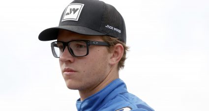 CONCORD, NORTH CAROLINA - MAY 28: Jack Wood, driver of the #24 Chevy Accessories Chevrolet, waits in the garage area during practice for the NASCAR Camping World Truck Series North Carolina Education Lottery 200 at Charlotte Motor Speedway on May 28, 2021 in Concord, North Carolina. (Photo by Maddie Meyer/Getty Images) | Getty Images