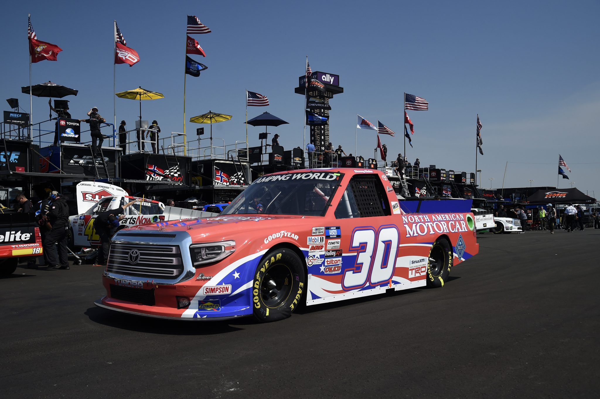 LEBANON, TENNESSEE - JUNE 18: Danny Bohn, driver of the #30 North American Motor Car Toyota, drives in the garage area during practice for the NASCAR Camping World Truck Series Rackley Roofing 200 at Nashville Superspeedway on June 18, 2021 in Lebanon, Tennessee. (Photo by Logan Riely/Getty Images) | Getty Images
