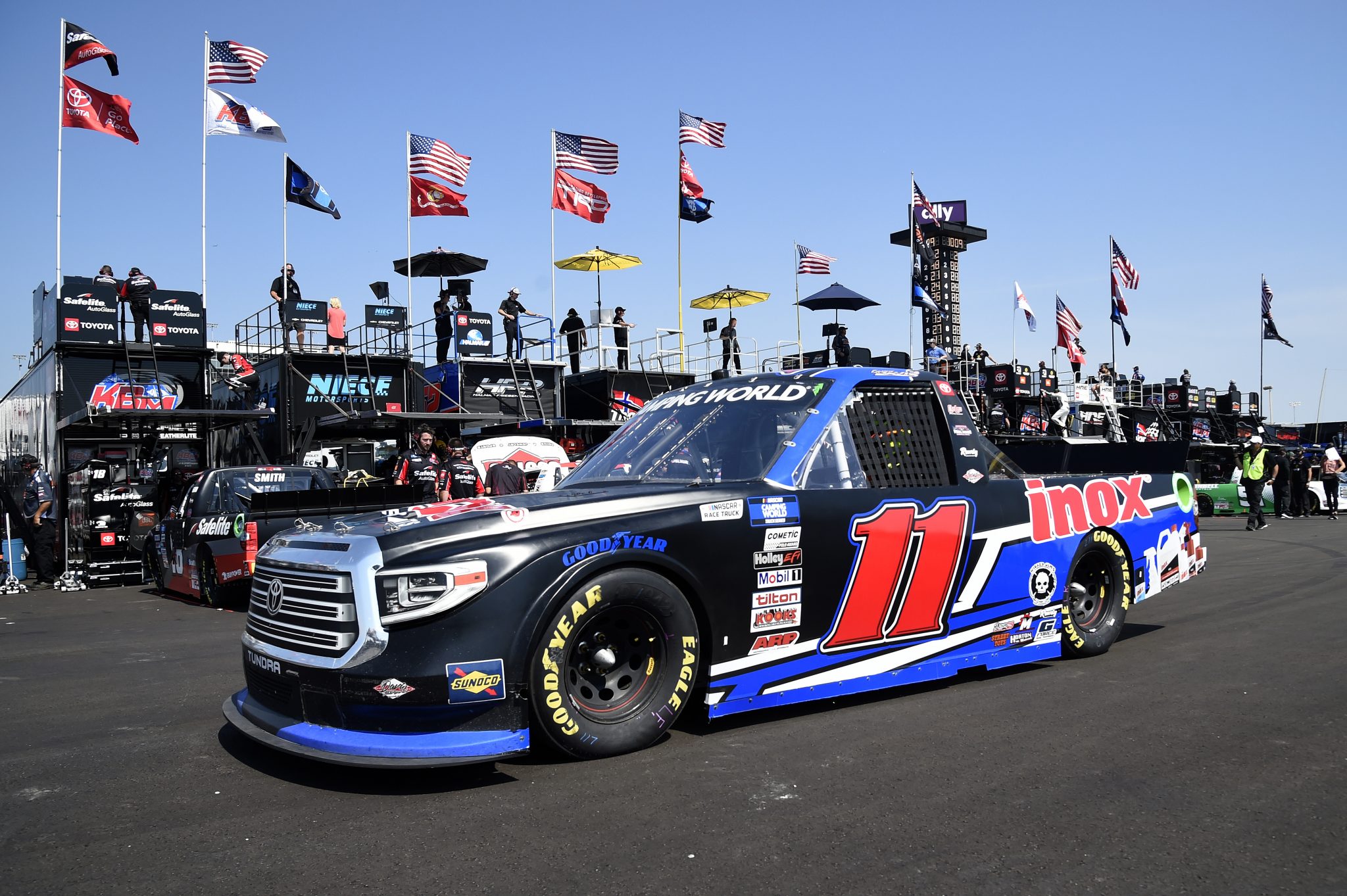 LEBANON, TENNESSEE - JUNE 18: Spencer Davis, driver of the #11 INOX Lubricants Toyota, drives in the garage area during practice for the NASCAR Camping World Truck Series Rackley Roofing 200 at Nashville Superspeedway on June 18, 2021 in Lebanon, Tennessee. (Photo by Logan Riely/Getty Images) | Getty Images