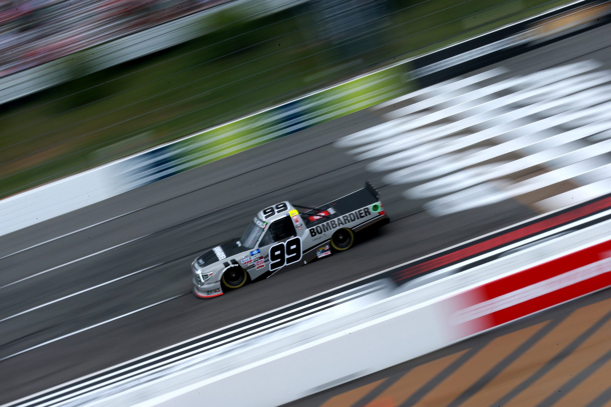 LONG POND, PENNSYLVANIA - JUNE 26: Ben Rhodes, driver of the #99 Toyota, drives during the NASCAR Camping World Truck Series CRC Brakleen 150 at Pocono Raceway on June 26, 2021 in Long Pond, Pennsylvania. (Photo by Sean Gardner/Getty Images) | Getty Images