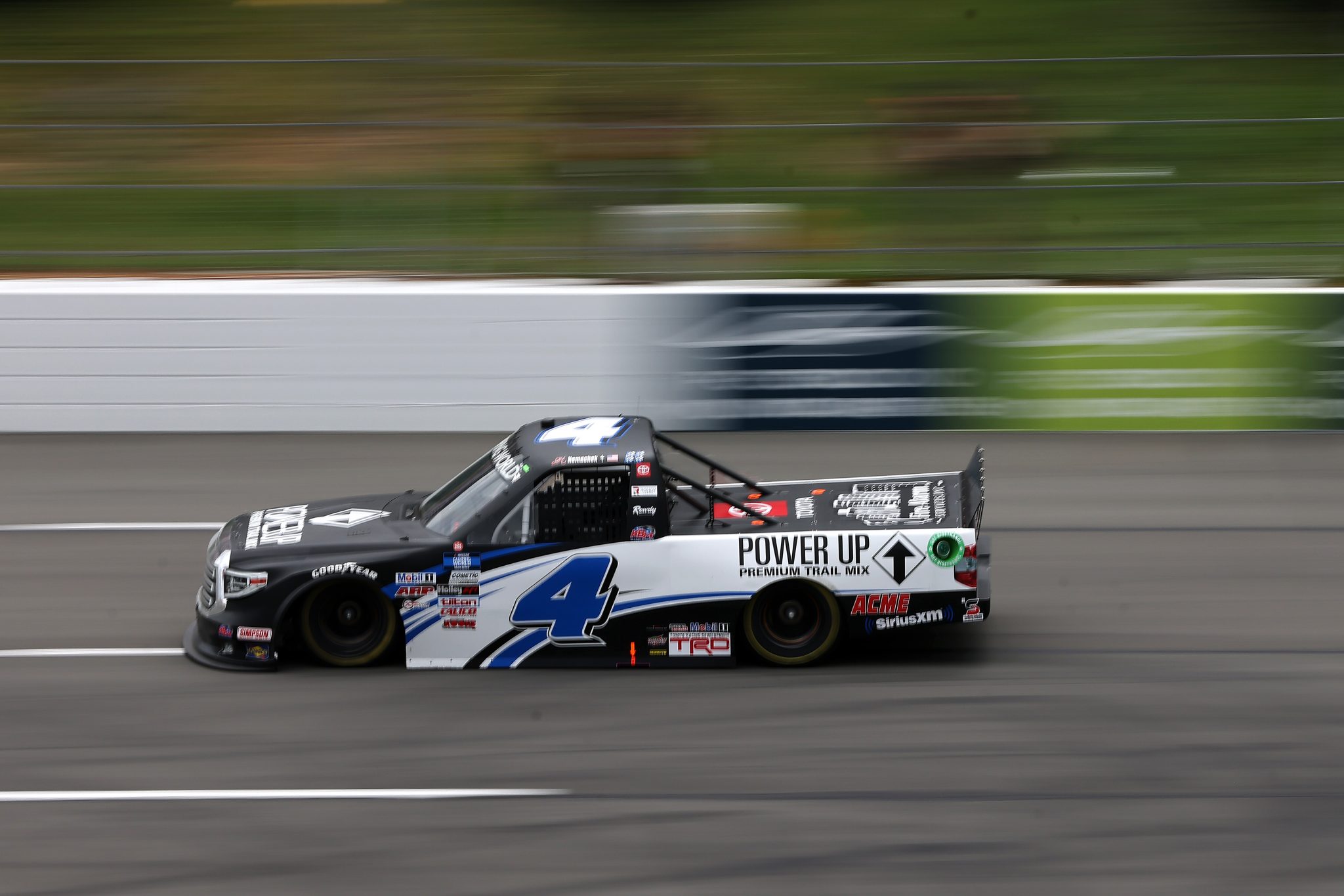 LONG POND, PENNSYLVANIA - JUNE 26: John Hunter Nemechek, driver of the #4 Power Up Premium Trail Mix Toyota, drives during the NASCAR Camping World Truck Series CRC Brakleen 150 at Pocono Raceway on June 26, 2021 in Long Pond, Pennsylvania. (Photo by James Gilbert/Getty Images) | Getty Images