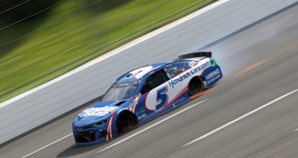 LONG POND, PENNSYLVANIA - JUNE 26: Kyle Larson, driver of the #5 HendrickCars.com Chevrolet, drives with a flat tire on the final turn of the NASCAR Cup Series Pocono Organics CBD 325 at Pocono Raceway on June 26, 2021 in Long Pond, Pennsylvania. (Photo by James Gilbert/Getty Images) | Getty Images