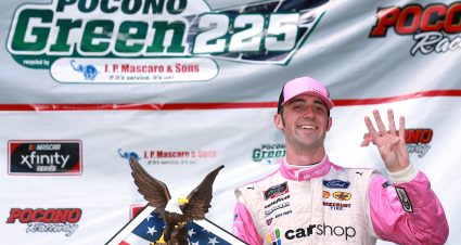 LONG POND, PENNSYLVANIA - JUNE 27: Austin Cindric, driver of the #22 Car Shop Ford, celebrates in victory lane after winning the NASCAR Xfinity Series Pocono Green 225 Recycled by J.P. Mascaro & Sons at Pocono Raceway on June 27, 2021 in Long Pond, Pennsylvania. (Photo by Sean Gardner/Getty Images) | Getty Images