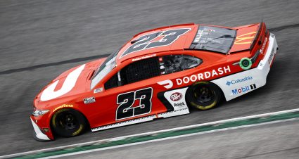 HAMPTON, GEORGIA - JULY 11: Bubba Wallace, driver of the #23 Door Dash Toyota, races during the NASCAR Cup Series Quaker State 400 presented by Walmart at Atlanta Motor Speedway on July 11, 2021 in Hampton, Georgia. (Photo by Jared C. Tilton/Getty Images) | Getty Images