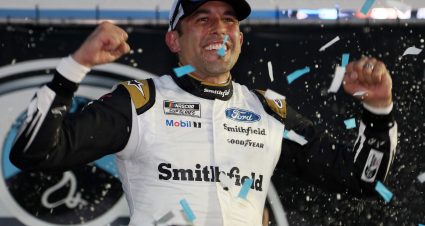 LOUDON, NEW HAMPSHIRE - JULY 18: Aric Almirola, driver of the #10 Smithfield Ford, celebrates in victory lane after winning the NASCAR Cup Series Foxwoods Resort Casino 301 at New Hampshire Motor Speedway on July 18, 2021 in Loudon, New Hampshire. (Photo by James Gilbert/Getty Images) | Getty Images