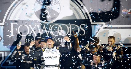 LOUDON, NEW HAMPSHIRE - JULY 18: Aric Almirola, driver of the #10 Smithfield Ford, celebrates in victory lane after winning the NASCAR Cup Series Foxwoods Resort Casino 301 at New Hampshire Motor Speedway on July 18, 2021 in Loudon, New Hampshire. (Photo by Jared C. Tilton/Getty Images) | Getty Images
