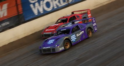 ROSSBURG, OHIO - JUNE 26: Bill Elliott #9 leads Helio Castroneves #3 during the Camping World Superstar Racing Experience event at Eldora Speedway on June 26, 2021 in Rossburg, Ohio. (Photo by Dylan Buell/SRX via Getty Images)