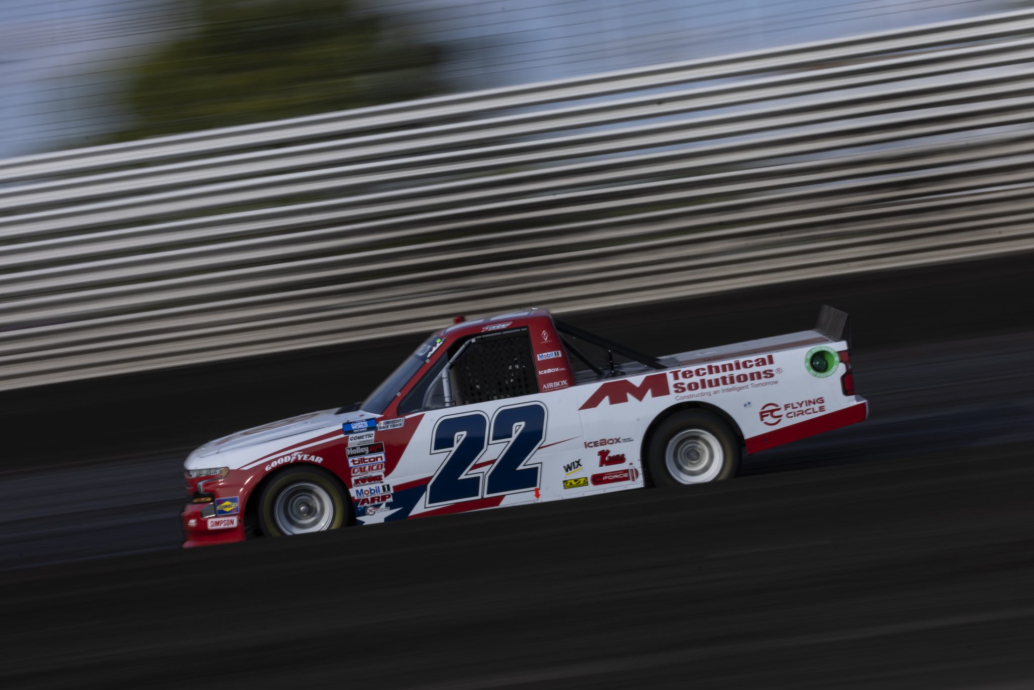KNOXVILLE, IOWA - JULY 08: Austin Wayne Self, driver of the #22 GOTEXAN/AM Technical Solutions Chevrolet, drives during practice for the NASCAR Camping World Truck Series Corn Belt 150 presented by Premier Chevy Dealers at Knoxville Raceway on July 08, 2021 in Knoxville, Iowa. (Photo by James Gilbert/Getty Images) | Getty Images