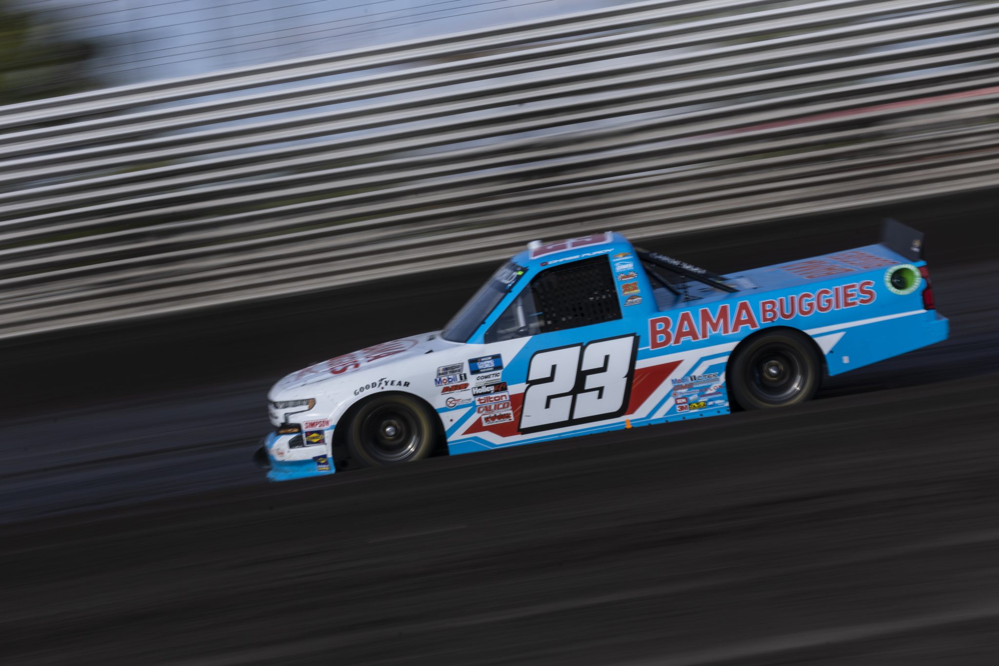 KNOXVILLE, IOWA - JULY 08: Chase Purdy, driver of the #23 BamaBuggies.com Chevrolet, drives during practice for the NASCAR Camping World Truck Series Corn Belt 150 presented by Premier Chevy Dealers at Knoxville Raceway on July 08, 2021 in Knoxville, Iowa. (Photo by James Gilbert/Getty Images) | Getty Images